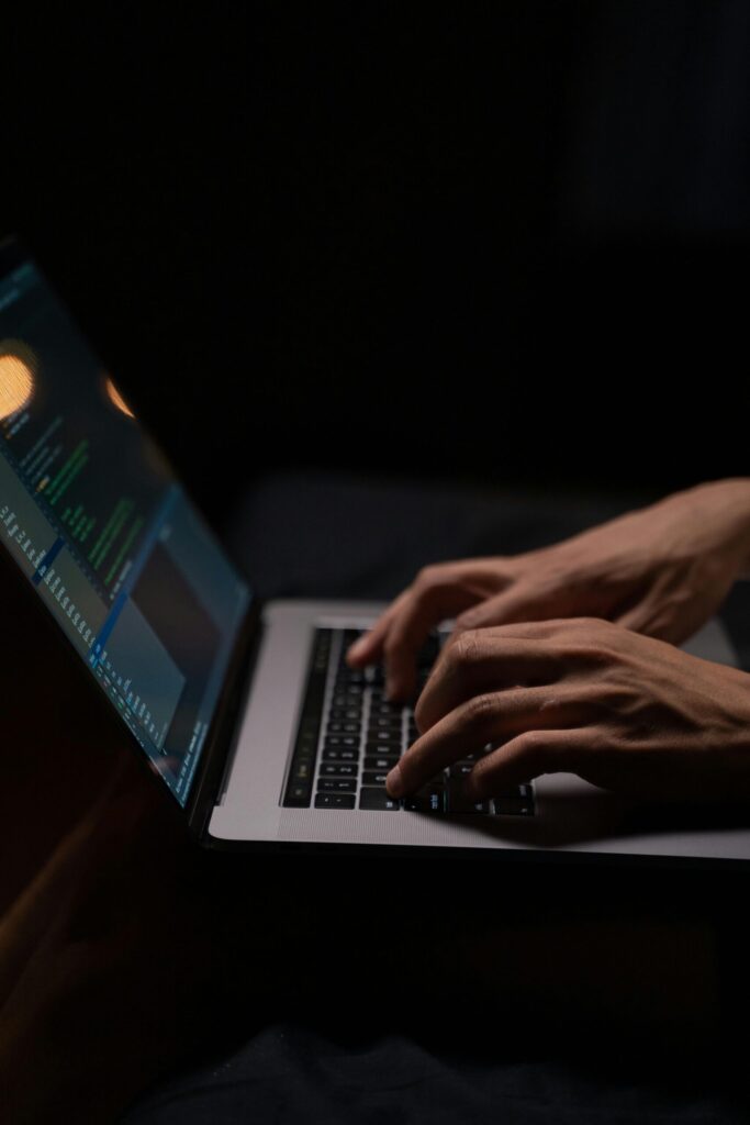 person-using-silver-and-black-laptop-computer