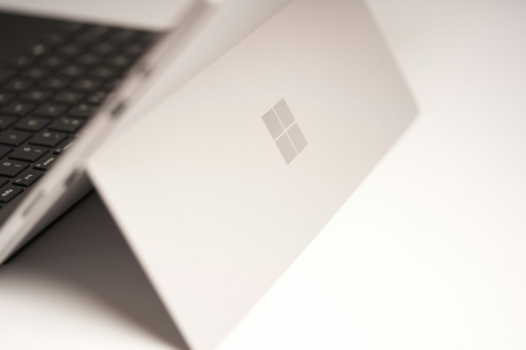 white-laptop-computer-on-white-table